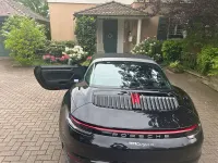Gebraucht Porsche 992 386 PS (283 kW) 2024 Schwarz Cabrio