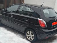 Gebraucht Kia Rio 96 PS (70 kW) 2010 Schwarz Kleinwagen