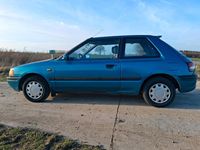 Gebraucht Mazda 323 73 PS (53 kW) 1993 Grün Kleinwagen