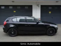 Second-hand BMW 116 122 CP (89 kW) 2011 Negru Hatchback