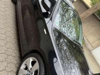 Second-hand BMW 116 122 CP (89 kW) 2011 Negru Hatchback