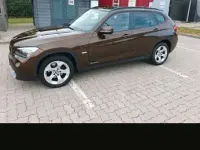 Używany BMW X1 177 KM (130 kW) 2012 Brązowy SUV