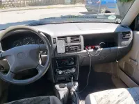 Używany Mazda Demio 63 KM (46 kW) 1998 Zielony Hatchback