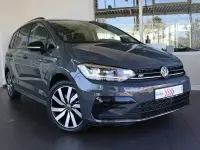Gebraucht VW Touran Highline 150 PS (110 kW) 2024 Grau (delfingrau metallic) Van / Kleinbus