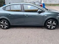 Używany Dacia Logan 90 KM (66 kW) 2024 Zielony Sedan/Limuzyna