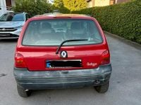 Second-hand Renault Twingo 58 CP (42 kW) 2006 Roșu Hatchback