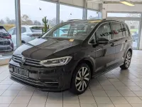 Gebraucht VW Touran Highline 150 PS (110 kW) 2025 Grenadillschwarz metallic Van / Kleinbus