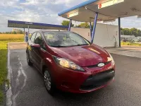 Gebraucht Ford Fiesta 60 PS (44 kW) 2009 Rot Kleinwagen