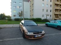 Gebraucht Mitsubishi Carisma 125 PS (91 kW) 2000 Braun metallic Limousine