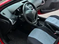 Gebraucht Peugeot 206+ 75 PS (55 kW) 2010 Rot Kleinwagen