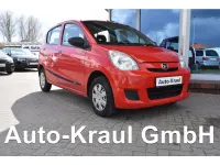 Gebraucht Daihatsu Cuore 69 PS (50 kW) 2010 Rot Kleinwagen