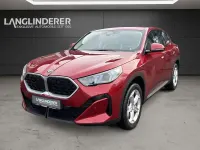 Gebraucht BMW X2 Sport Line 156 PS (114 kW) 2024 Dragon fire rot metallic SUV
