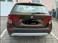 Używany BMW X1 177 KM (130 kW) 2012 Brązowy SUV