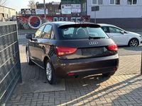 Używany Audi A1 Attraction 90 KM (66 kW) 2013 Brązowy Hatchback