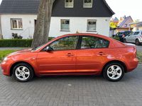 Używany Mazda 3 105 KM (77 kW) 2005 Czerwony Sedan/Limuzyna