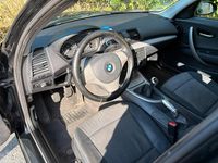 Second-hand BMW 116 115 CP (84 kW) 2006 Negru Hatchback