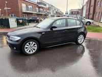 Gebraucht BMW 118 129 PS (94 kW) 2007 Schwarz Kleinwagen