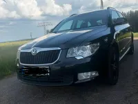 Gebraucht Skoda Superb Comfort 140 PS (102 kW) 2011 Schwarz Kombi