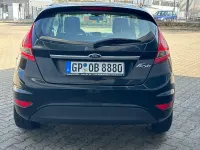 Używany Ford Fiesta Titanium 97 KM (71 kW) 2012 Czarny Sedan/Limuzyna