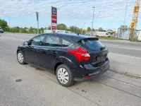 Używany Ford Focus Titanium 116 KM (85 kW) 2014 Czarny Sedan/Limuzyna