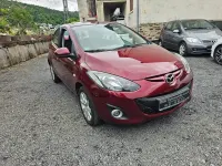 Gebraucht Mazda 2 Active 75 PS (55 kW) 2011 Rot Kleinwagen