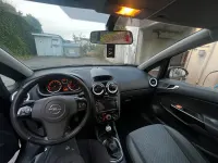 Używany Opel Corsa 75 KM (55 kW) 2010 Czarny Hatchback