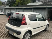 Gebraucht Peugeot 107 68 PS (50 kW) 2014 Weiß Kleinwagen