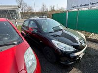 Gebraucht Peugeot 206+ Basis 73 PS (53 kW) 2012 Schwarz Kleinwagen