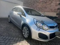 Second-hand Kia Rio 86 CP (63 kW) 2012 Argintiu Berlinǎ