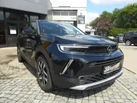 Gebraucht Opel Mokka-e Elegance 100 kW (136 PS) 2023 Karbon schwarz metallic SUV