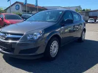 Używany Opel Astra Selection 90 KM (66 kW) 2009 Szary Sedan/Limuzyna