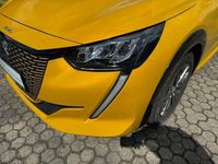 Gebraucht Peugeot e-208 Allure 100 kW (136 PS) 2021 Lack gelb faro/typ aussenverkleidung met (metallic) Kleinwagen
