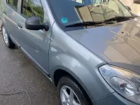 Second-hand Dacia Sandero 75 CP (55 kW) 2010 Gri Berlinǎ