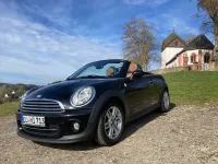 Käytetty Mini Cooper Cabriolet 122 HP (89 kW) 2012 Musta Avoauto