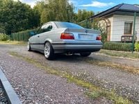Second-hand BMW 320 Basis 150 CP (110 kW) 1994 Argintiu Coupe