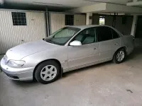 Second-hand Opel Omega 144 CP (105 kW) 2001 Argintiu Berlinǎ
