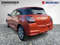 Neu Suzuki Swift Comfort 83 PS (61 kW) 2026 Flame orange pearl metallic Kleinwagen
