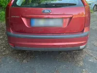 Używany Ford Focus 101 KM (74 kW) 2007 Czerwony Sedan/Limuzyna