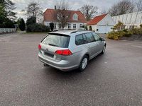 Second-hand VW Golf VII 105 CP (77 kW) 2014 Argintiu Break