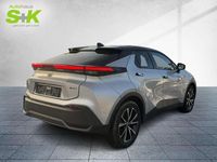 Gebraucht Toyota C-HR Team 197 PS (144 kW) 2024 Shimmering silver metallic / dach schwarz (schwarz) SUV