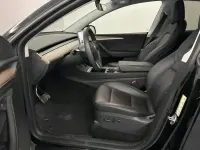 Gebraucht Tesla Model Y 378 kW (514 PS) 2023 Sonderlackierung schwarz SUV