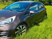 Gebraucht Kia Rio Platinum Edition 109 PS (80 kW) 2015 Braun Limousine