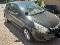 Gebraucht Opel Corsa Active 87 PS (63 kW) 2013 Schwarz Kleinwagen