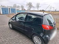 Second-hand Mitsubishi Colt 70 CP (51 kW) 2006 Negru Berlinǎ
