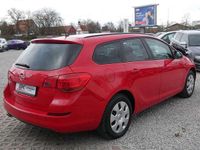 Gebraucht Opel Astra 120 PS (88 kW) 2011 Power rot/traffic red ral3020 Kombi