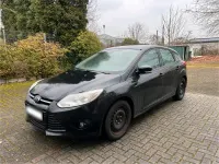 Używany Ford Focus 100 KM (73 kW) 2014 Czarny Sedan/Limuzyna