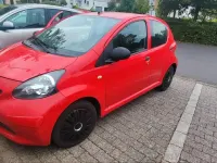 Gebraucht Toyota Aygo 68 PS (50 kW) 2008 Rot Kleinwagen