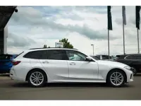 Gebraucht BMW 318 150 PS (110 kW) 2023 Mineralweiss metallic Kombi