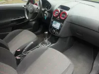 Usata Opel Corsa 101 CV (74 kW) 2011 Rosso Utilitaria