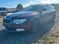 Używany Skoda Superb 160 KM (117 kW) 2010 Czerwony Kombi